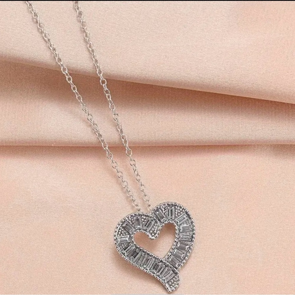 Silver heart shaped diamond necklace
